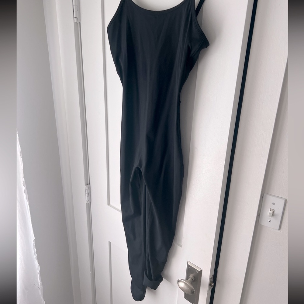 Black fitted activewear jumpsuit